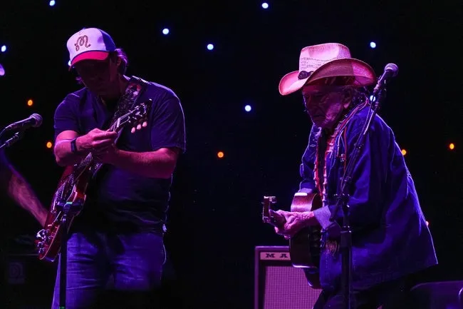 Willie Nelson, right, and Lukas Nelson, left, take the stage at Luck Reunion at Luck Ranch on Thursday, March, 13, 2025 in Spicewood, Texas.