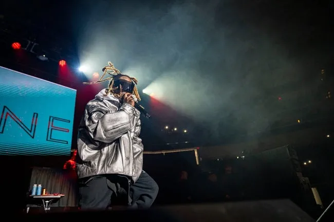 Rapper Lil Wayne performs at Wells Fargo Arena, Thursday, April 11, 2024 in Des Moines, Iowa.