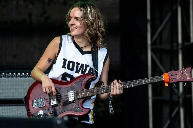 Kaylee Stenberg, Des Moines native, performs in Ethel Cain's band while wearing a Caitlin Clark jersey during Hinterland Music Festival on Sunday, Aug. 4, 2024 in St. Charles.