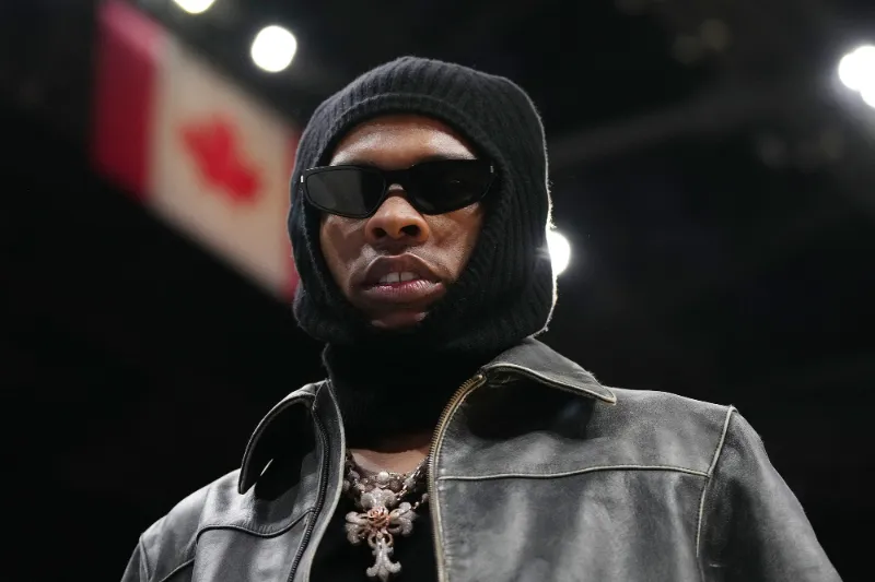 Dec 8, 2023; Miami, Florida, USA; American rapper Lil Baby walks court-side during the second half between the Miami Heat and the Cleveland Cavaliers at Kaseya Center. © Jasen Vinlove-Imagn ImagesDec 8, 2023; Miami, Florida, USA; American rapper Lil Baby walks court-side during the second half between the Miami Heat and the Cleveland Cavaliers at Kaseya Center. © Jasen Vinlove-Imagn Images