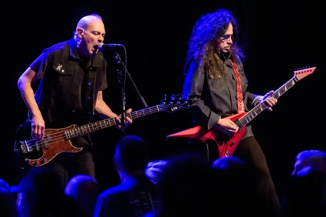 Bassist Joey Vera, left, and guitarist Phil Sandoval perform with Armored Saint on Wednesday, April 10, 2024 at the Peoria Civic Center Theater.